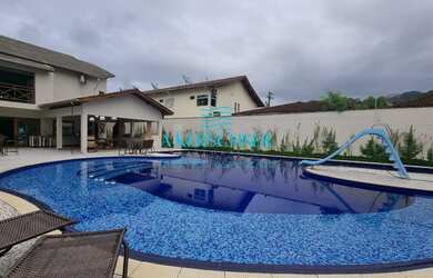 Imagem: A casa possui 5 Dormitórios, 5 Banheiros, 5 Vagas na garagem