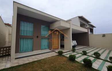 Imagem: A casa possui 3 Dormitórios, 3 Banheiros, 4 Vagas na garagem