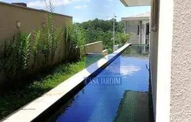 Imagem: A casa em condomínio possui 4 Dormitórios, 4 Banheiros, 4