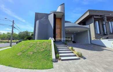 Imagem: A casa em condomínio possui 3 Dormitórios, 5 Banheiros, 4