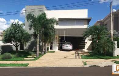 Imagem: A casa em condomínio possui 4 Dormitórios, 5 Banheiros, 4