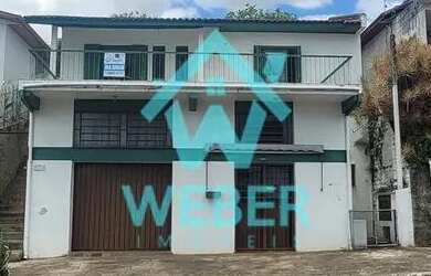 Imagem: A casa possui 2 Dormitórios, 1 Banheiro, 1 Vaga na garagem