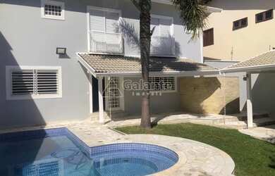 Imagem: A casa possui 3 Dormitórios, 4 Banheiros, 4 Vagas na garagem