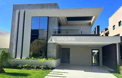 Imagem: A casa em condomínio possui 4 Dormitórios, 5 Banheiros, 2