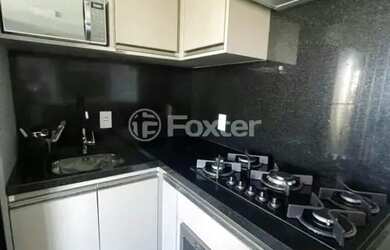 Imagem: O apartamento possui 2 Dormitórios, 1 Banheiro, 1 Vaga na garagem