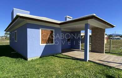 Imagem: A casa possui 3 Dormitórios, 1 Banheiro, 80m² de Área e Churrasqueira