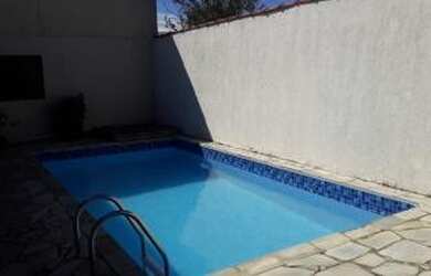 Imagem: A casa possui 2 Dormitórios, 5 Banheiros, 3 Vagas na garagem