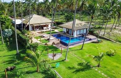 Imagem: A casa possui 5 Dormitórios, 5 Banheiros, 5 Vagas na garagem