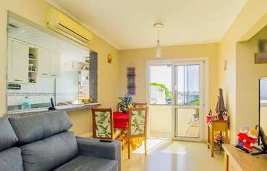 Imagem: O apartamento possui 2 Dormitórios, 1 Banheiro, 1 Vaga na garagem