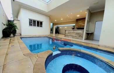 Imagem: A casa em condomínio possui 5 Dormitórios, 5 Banheiros, 4