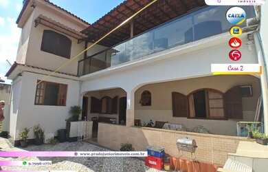 Imagem: A casa possui 3 Dormitórios, 2 Banheiros, 5 Vagas na garagem