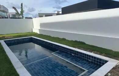 Imagem: A casa em condomínio possui 4 Dormitórios, 5 Banheiros, 4