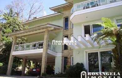 Imagem: A casa em condomínio possui 5 Dormitórios, 5 Banheiros, 5