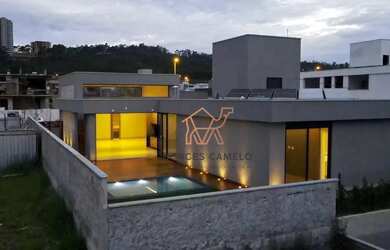 Imagem: A casa em condomínio possui 4 Dormitórios, 5 Banheiros, 4