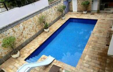 Imagem: A casa em condomínio possui 4 Dormitórios, 1 Banheiro, 4 Vagas