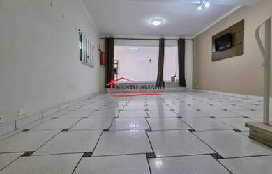 Imagem: A casa possui 3 Dormitórios, 4 Banheiros, 2 Vagas na garagem