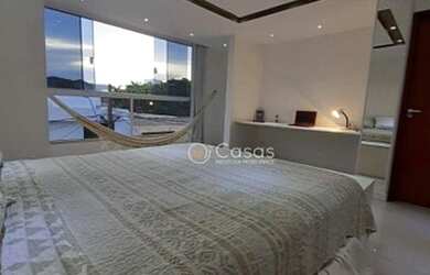 Imagem: A casa possui 5 Dormitórios, 3 Banheiros, 4 Vagas na garagem