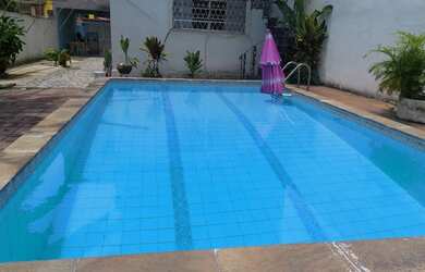 Imagem: A casa possui 4 Dormitórios, 3 Banheiros, 4 Vagas na garagem