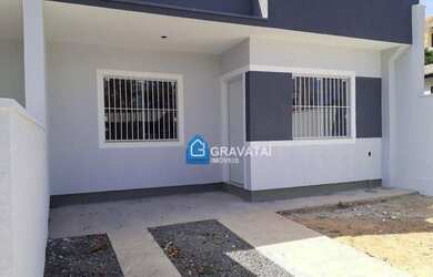 Imagem: A casa possui 2 Dormitórios, 1 Banheiro, 1 Vaga na garagem