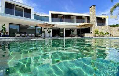 Imagem: A casa em condomínio possui 5 Dormitórios, 5 Banheiros, 5