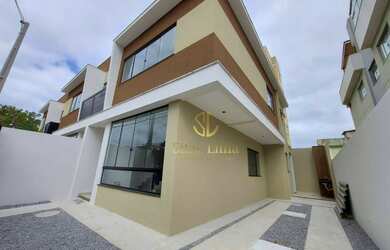 Imagem: A casa possui 3 Dormitórios, 4 Banheiros, 2 Vagas na garagem