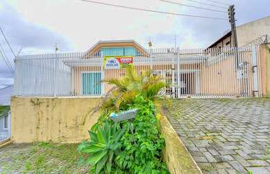 Imagem 2: Casa de 248 m² com 3 quartos no Bairro Guabirotuba