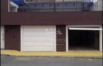 Imagem: A casa possui 3 Dormitórios, 5 Banheiros, 3 Vagas na garagem