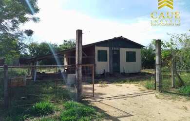 Imagem: A casa em condomínio possui 2 Dormitórios, 1 Banheiro e 790m²