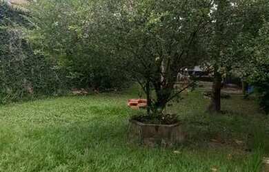 Imagem: A casa possui 2 Dormitórios, 3 Banheiros, 4 Vagas na garagem