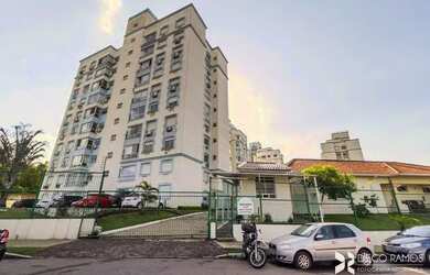 Imagem: O apartamento possui 3 Dormitórios, 1 Banheiro, 1 Vaga na garagem