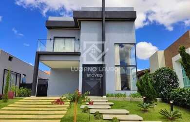 Imagem: A casa possui 4 Dormitórios, 5 Banheiros, 2 Vagas na garagem