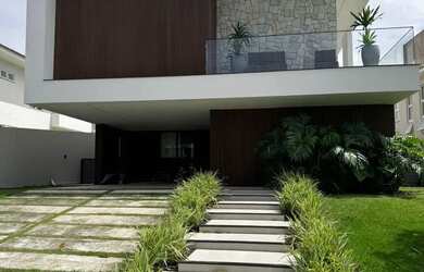 Imagem: A casa em condomínio possui 4 Dormitórios, 5 Banheiros, 4