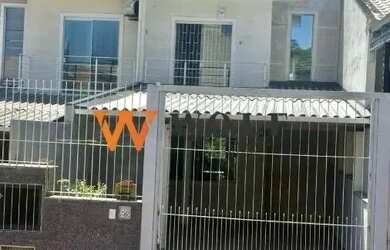 Imagem: A casa possui 3 Dormitórios, 2 Banheiros, 2 Vagas na garagem