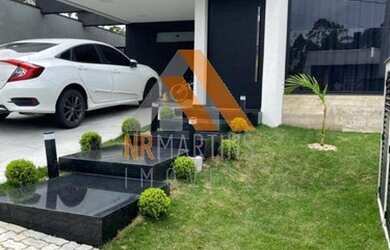 Imagem: A casa em condomínio possui 3 Dormitórios, 4 Banheiros, 2