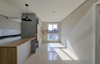 Imagem: O apartamento possui 1 Dormitório, 1 Banheiro, 1 Vaga na garagem