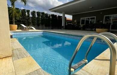 Imagem: A casa em condomínio possui 3 Dormitórios, 5 Banheiros, 5