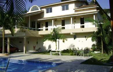 Imagem: A casa em condomínio possui 5 Dormitórios, 5 Banheiros, 5