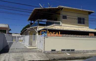 Imagem: A casa possui 2 Dormitórios, 1 Banheiro, 2 Vagas na garagem