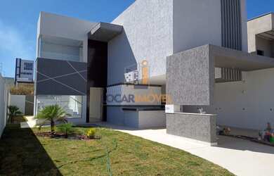 Imagem: A casa possui 4 Dormitórios, 4 Banheiros, 4 Vagas na garagem