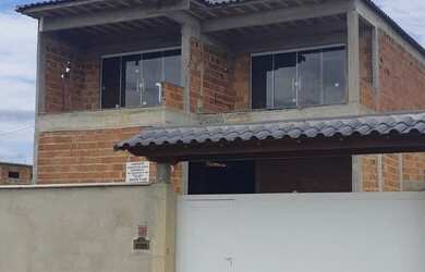 Imagem: A casa possui 3 Dormitórios, 3 Banheiros, 4 Vagas na garagem