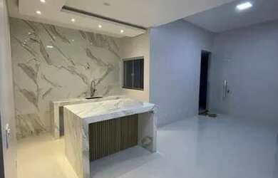 Imagem: A casa possui 3 Dormitórios, 2 Banheiros, 2 Vagas na garagem