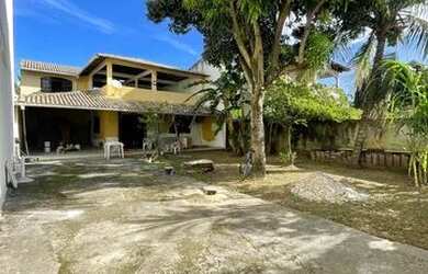 Imagem: A casa possui 3 Dormitórios, 3 Banheiros, 5 Vagas na garagem