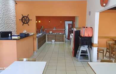 Imagem: A casa possui 5 Dormitórios, 4 Banheiros, 4 Vagas na garagem