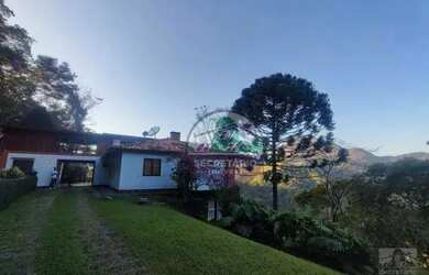 Imagem: A casa possui 5 Dormitórios, 5 Banheiros, 2 Vagas na garagem