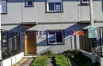 Imagem: A casa possui 3 Dormitórios, 2 Banheiros, 1 Vaga na garagem