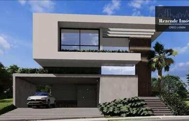 Imagem: A casa possui 4 Dormitórios, 4 Banheiros, 5 Vagas na garagem