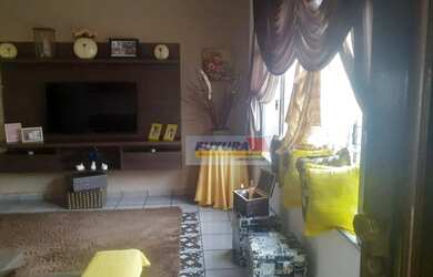 Imagem: A casa possui 3 Dormitórios, 2 Banheiros, 4 Vagas na garagem