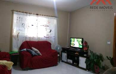 Imagem: A casa possui 3 Dormitórios, 2 Banheiros, 2 Vagas na garagem