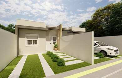 Imagem: A casa possui 2 Dormitórios, 1 Banheiro, 1 Vaga na garagem