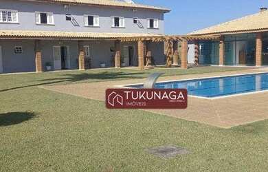 Imagem: A casa em condomínio possui 5 Dormitórios, 5 Banheiros, 5